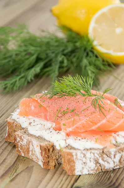 Salmon on a bread with horseradish — Stock Photo, Image