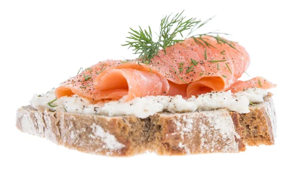 Salmon on a bread against white — Stock Photo, Image