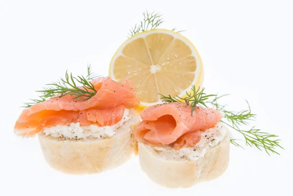 Baguette with Salmon on white — Stock Photo, Image