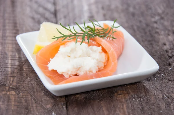 Salmon starters on small plates — Stock Photo, Image