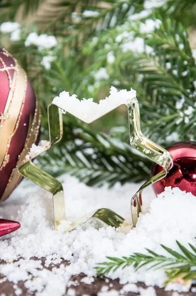 Sneeuw bedekt ster bakvorm — Stockfoto