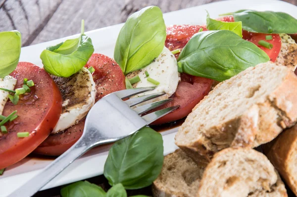 Tomaat en mozzarella sneetjes — Stockfoto