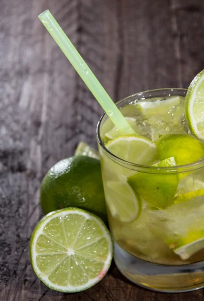 Cocktail on wooden background — Stock Photo, Image