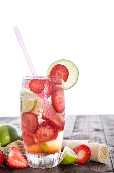 Strawberry Caipirinha on a wooden Table against white — Stock Photo, Image