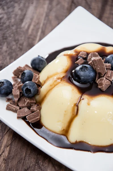 Homemade Pudding with chocolate sauce — Stock Photo, Image