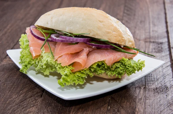 Salmon Bun on a plate — Stock Photo, Image