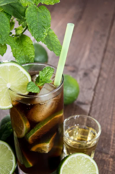 Fresh made Cuba Libre on wood Royalty Free Stock Images