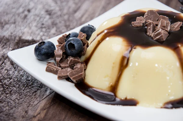 Homemade Pudding with chocolate sauce — Stock Photo, Image