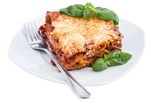 Lasagne on a plate (white background) — Stock Photo, Image