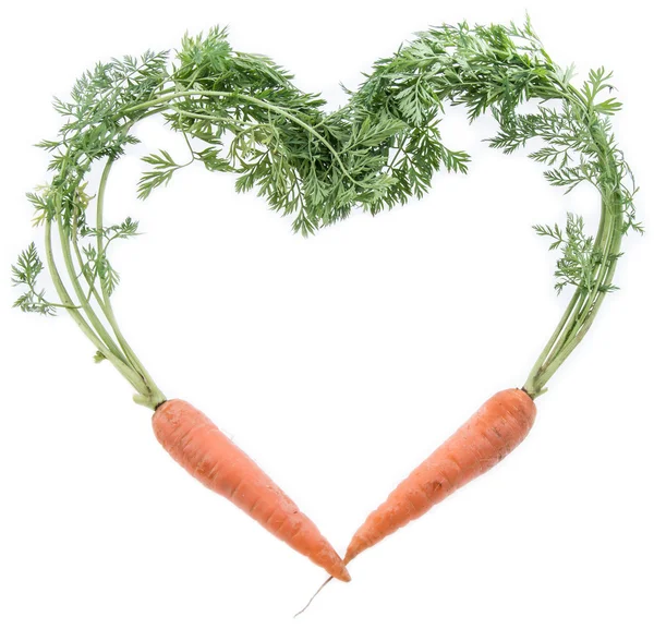 Świeże marchewki kształtowaniu serca — Zdjęcie stockowe