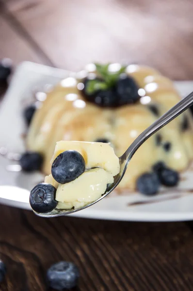 Spoon with Pudding and Blueberries — Stock Photo, Image