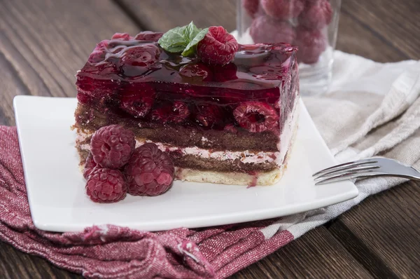 Gedeelte voor zelfgemaakte raspberry tart — Stockfoto