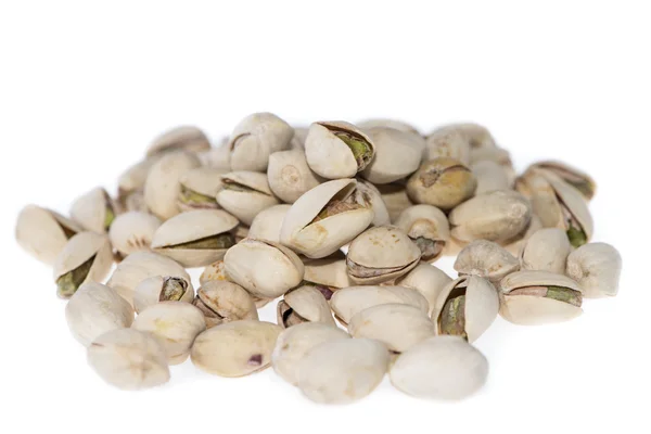 Kupie pistacji biały — Zdjęcie stockowe