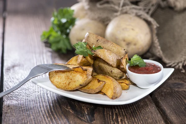 Portion of fresh made Potato Wedges — Stock Photo, Image