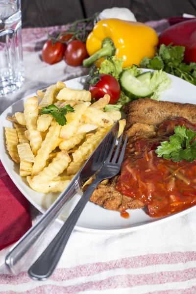 Portion of Schnitzel with Sauce — Stock Photo, Image