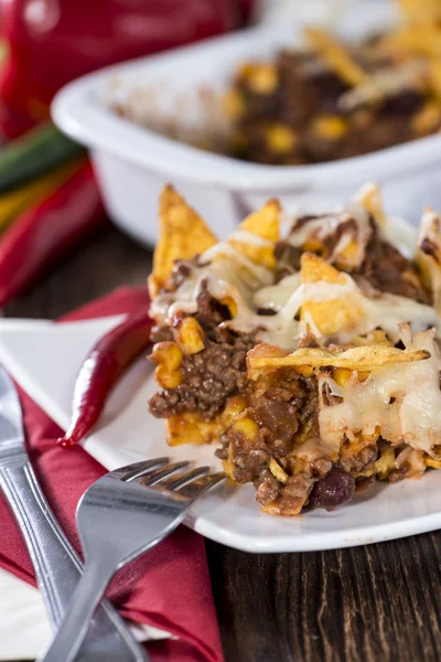 Nachos gratinated with cheese — Stock Photo, Image