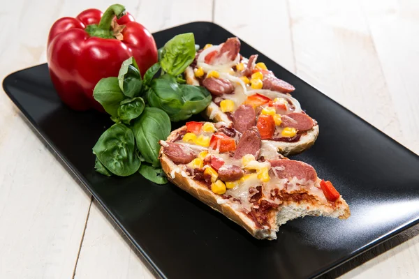 Portion of Salami Pizza Baguette — Stock Photo, Image