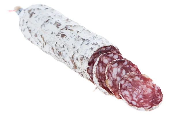 Del av salami på vit — Stockfoto