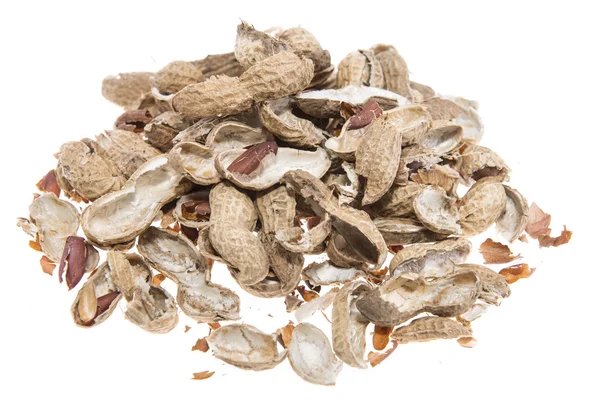 Heap of Peanut shells isolated on white — Stock Photo, Image