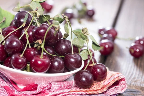 Portion of Cherries on wood — Stock Photo, Image