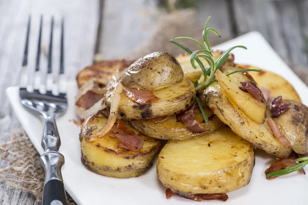 Portion of roasted Potatoes — Stock Photo, Image