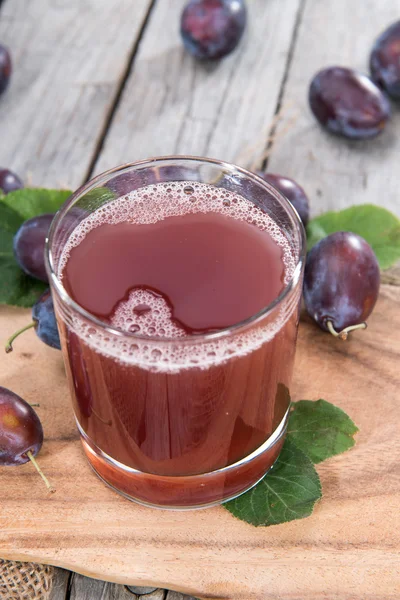 Glass with fresh Plum Juice — Stock Photo, Image