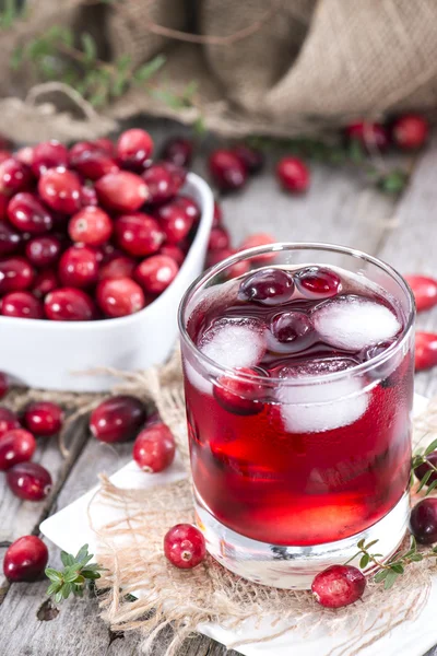 Bicchiere con succo di mirtillo rosso — Foto Stock