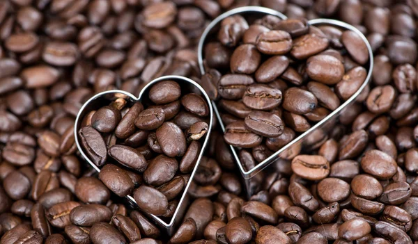 Kaffe bakgrund (med hjärtan) — Stockfoto
