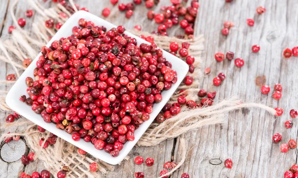 Portion rosa Pfefferkörner — Stockfoto