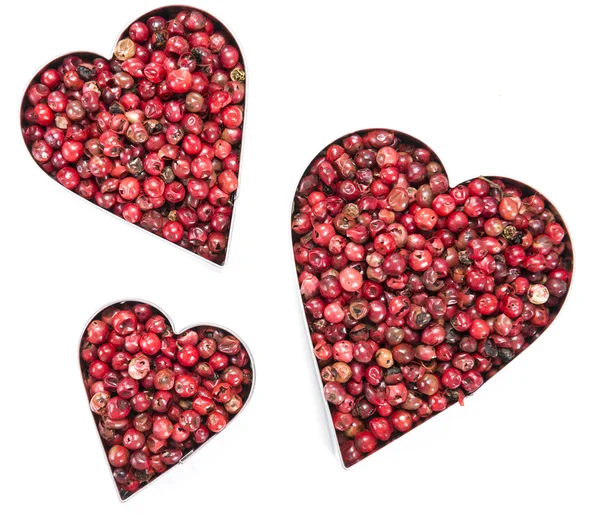 Růžový pepř srdce tvar — Stock fotografie