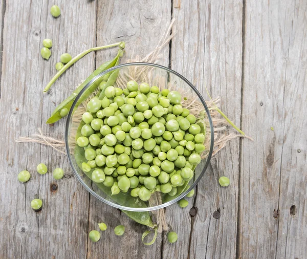 Small bowl with fresh Peas — Stock Photo, Image