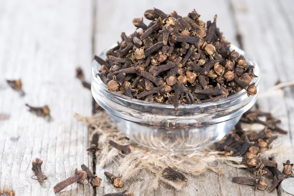 Cloves in a small bowl — Stock Photo, Image