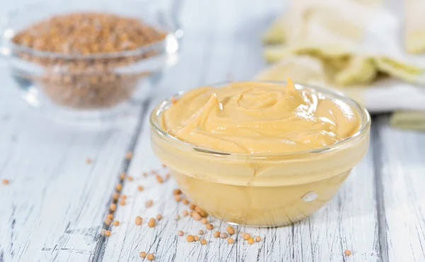 Mustard in a small bowl — Stock Photo, Image