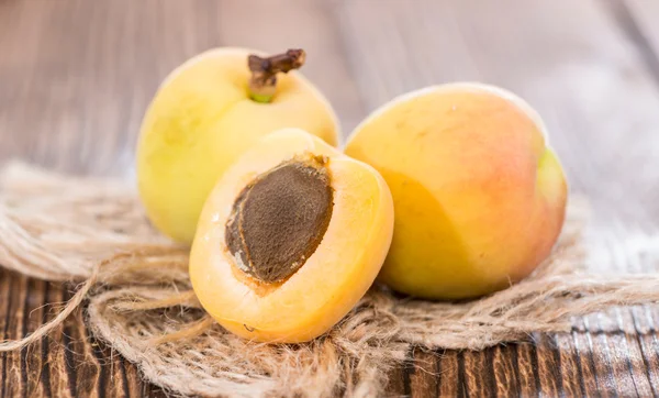 Wooden table with fresh Apricots — Stock Photo, Image