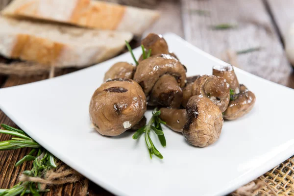 Mushrooms marinated with olive oil — Stock Photo, Image