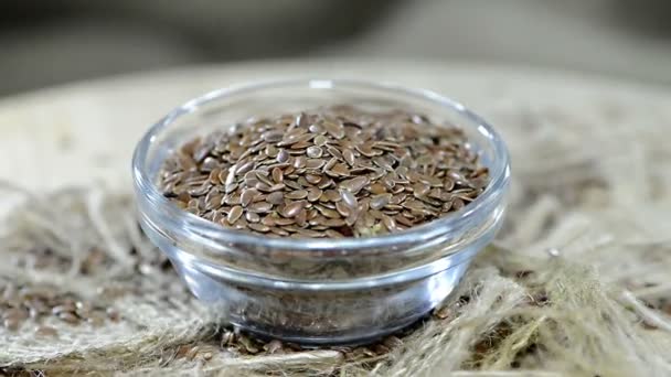 Semillas de lino en un tazón — Vídeo de stock