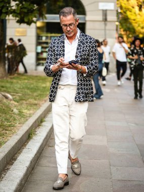 MILAN, Italy- September 22 2021: Men on the street in Milan.