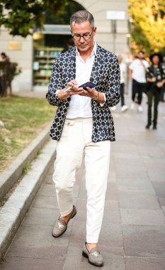 MILAN, Italy- September 22 2021: Men on the street in Milan.