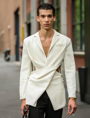 MILAN, Italy- September 22 2021: Men on the street in Milan.