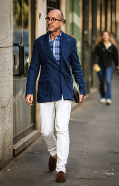 MILAN, Italy- September 23 2021: Men on the street in Milan.