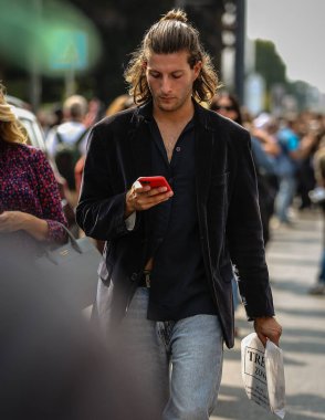 MILAN, Italy- September 23 2021: Men on the street in Milan.