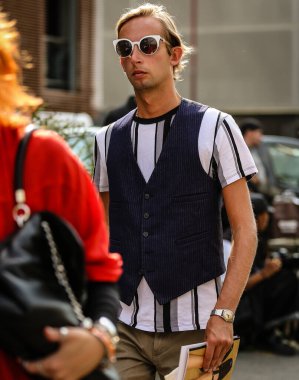 MILAN, Italy- September 23 2021: Men on the street in Milan.