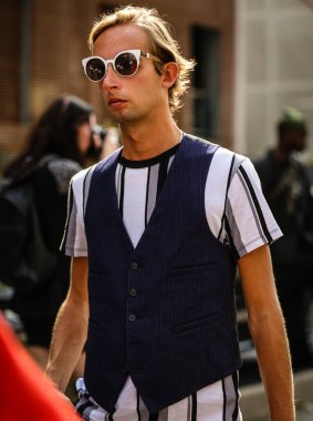 MILAN, Italy- September 23 2021: Men on the street in Milan.