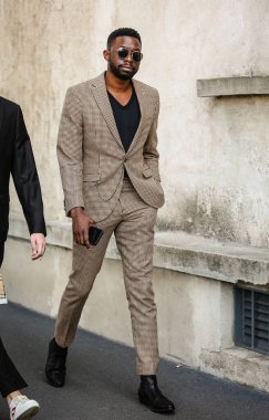 MILAN, Italy- September 24 2021: Men on the street in Milan.