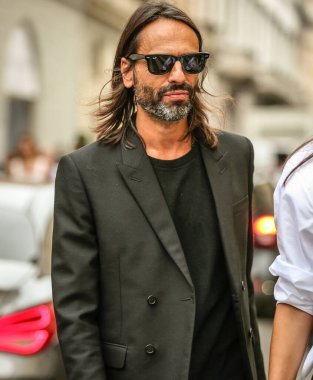 MILAN, Italy- September 25 2021: Men on the street in Milan.