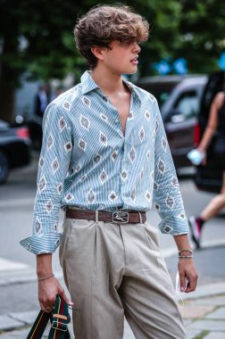 MILAN, Italy- June 20 2021: Men on the street in Milan.