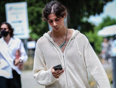 MILAN, Italy- June 20 2021: Men on the street in Milan.