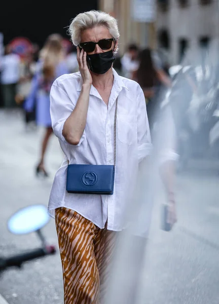 MILAN, Italy- June 21 2021: Women on the street in Milan.