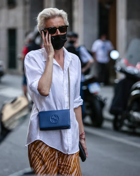 MILAN, Italy- June 21 2021: Women on the street in Milan.