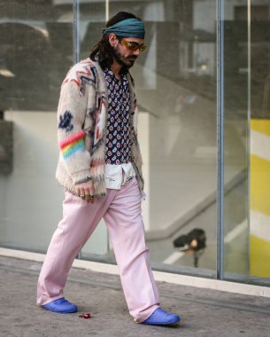MILAN, Italy- January 16 2022: Giotto Calendoli on the street in Milan.